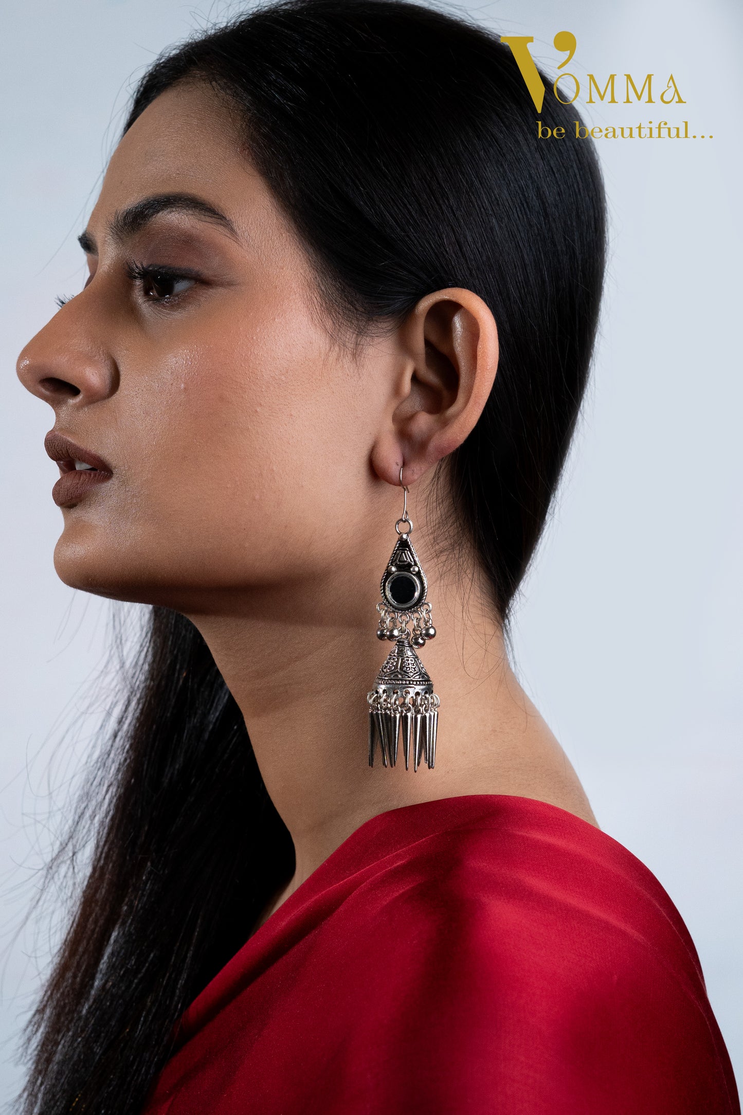 Vomma Teardrop shaped Long oxidised earrings