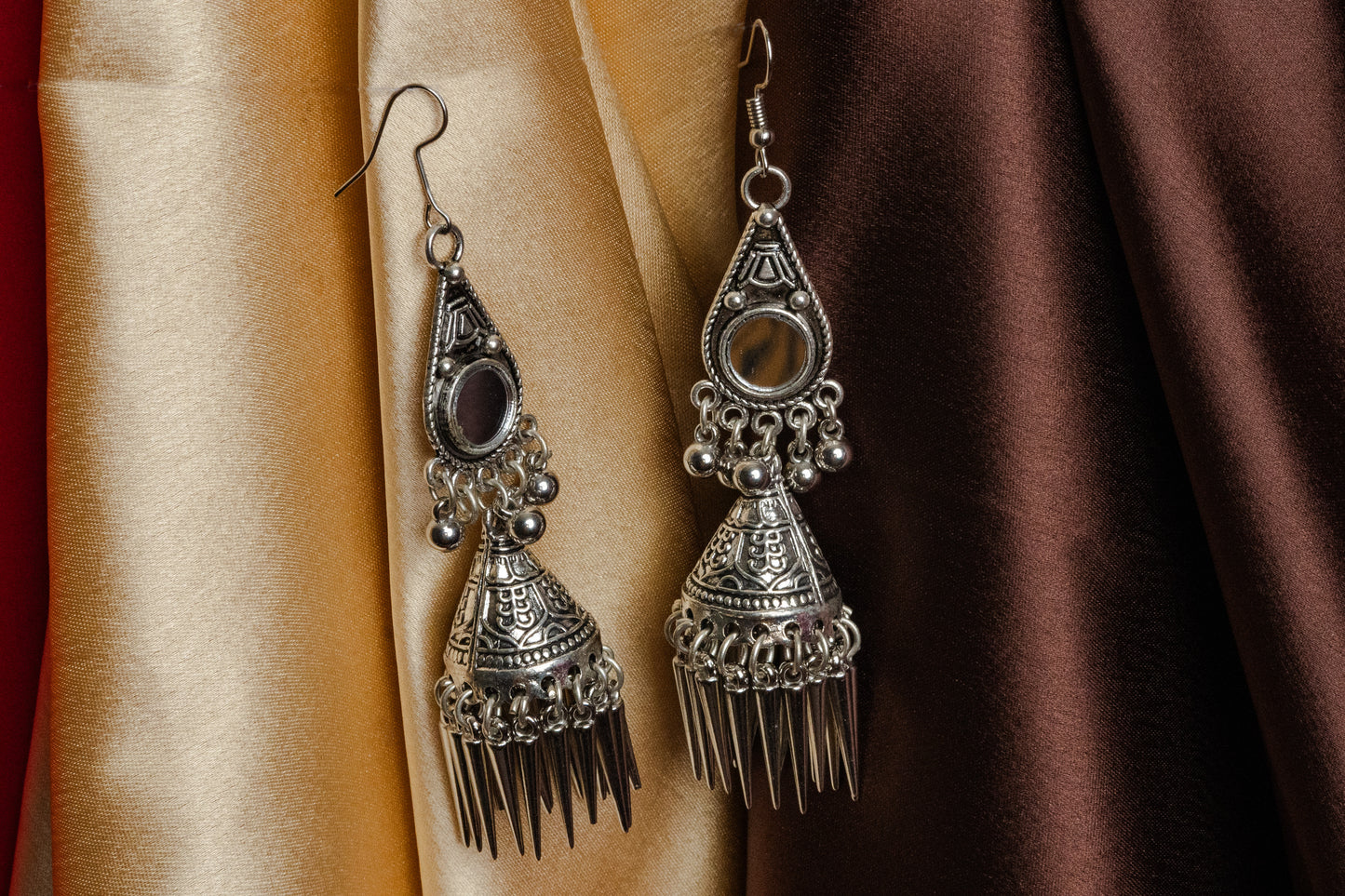 Vomma Teardrop shaped Long oxidised earrings