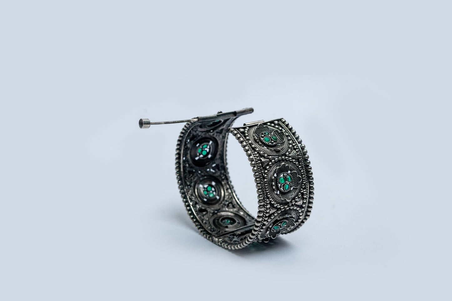 Oxidised Kada with green stone floral design