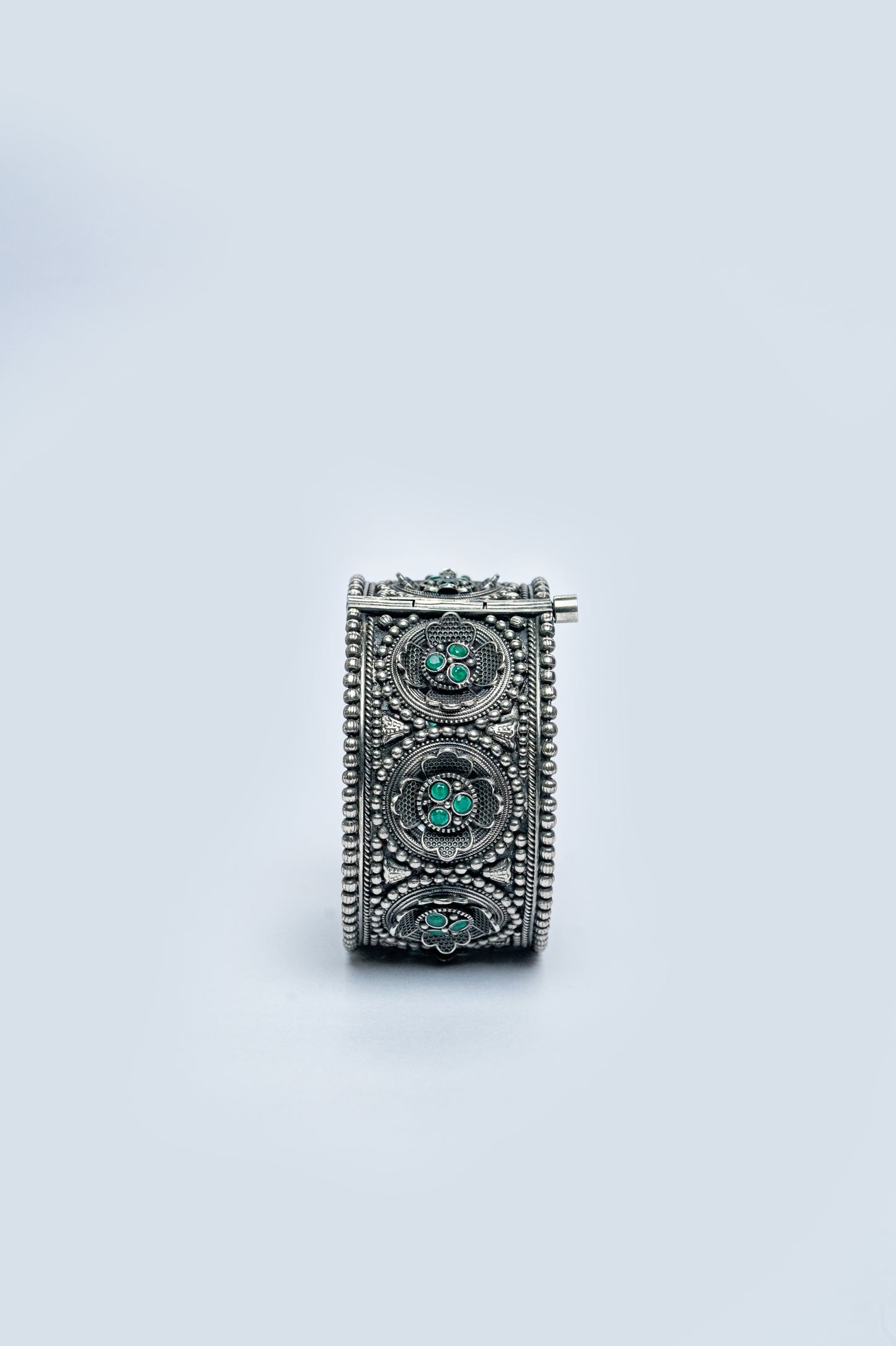 Oxidised Kada with green stone floral design
