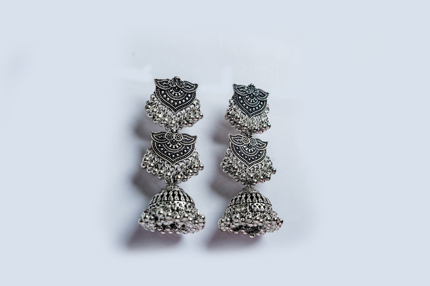 Vomma Oxidised long earrings with antique design