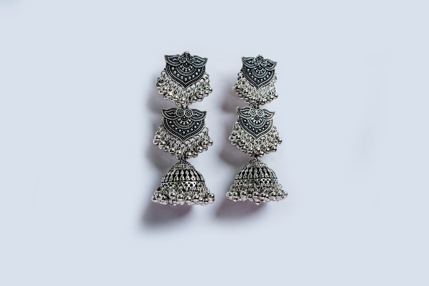 Vomma Oxidised long earrings with antique design