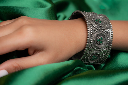 Oxidised Kada with green stone floral design