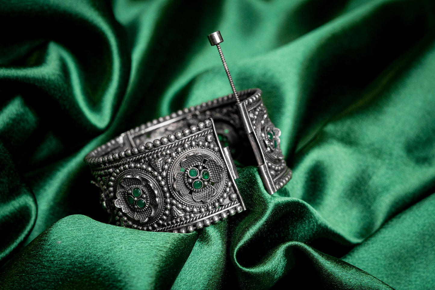 Oxidised Kada with green stone floral design