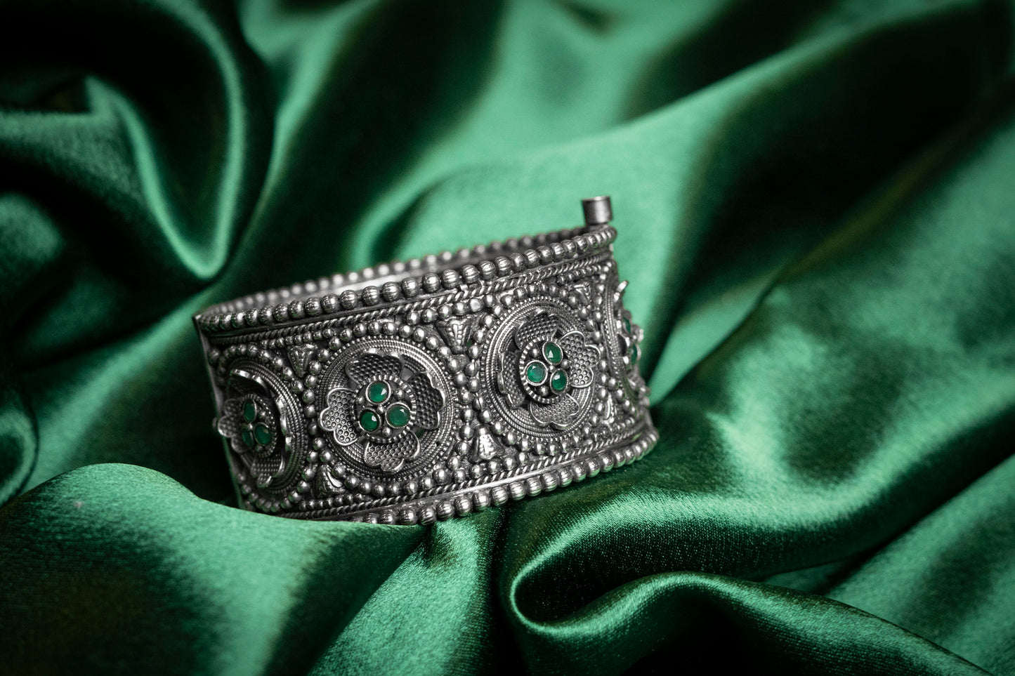 Oxidised Kada with green stone floral design